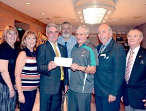 Photograph of Ernie Speed receiving his Ryde Sports Foundation Award