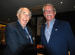 Photo of Jim Hull OAM congratulating Rob Wilkinson at the 2020 AGM